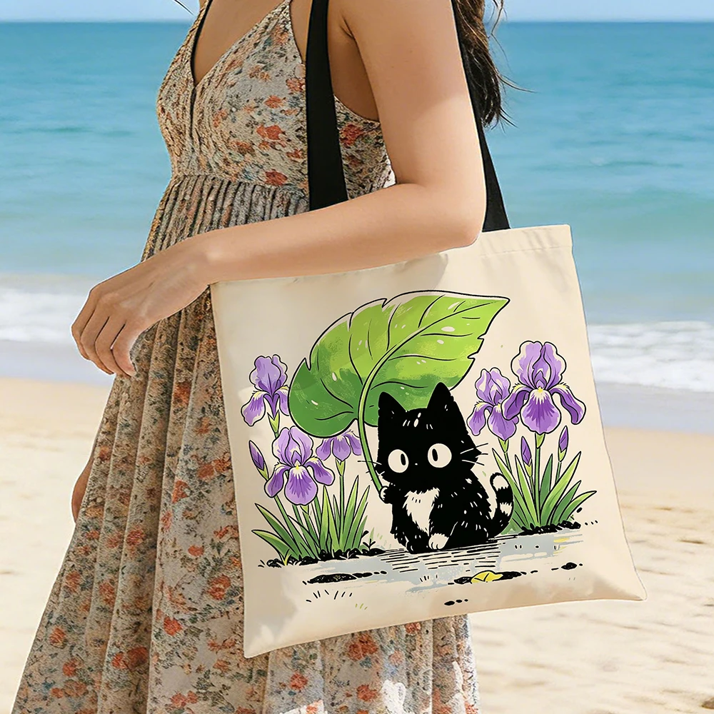 Cute Black Kitten Iris Flower Canvas Tote Bag &ndash; Adorable Cat Holding Leaf Umbrella Floral Print, Eco-Friendly Soft Shoulder Bag