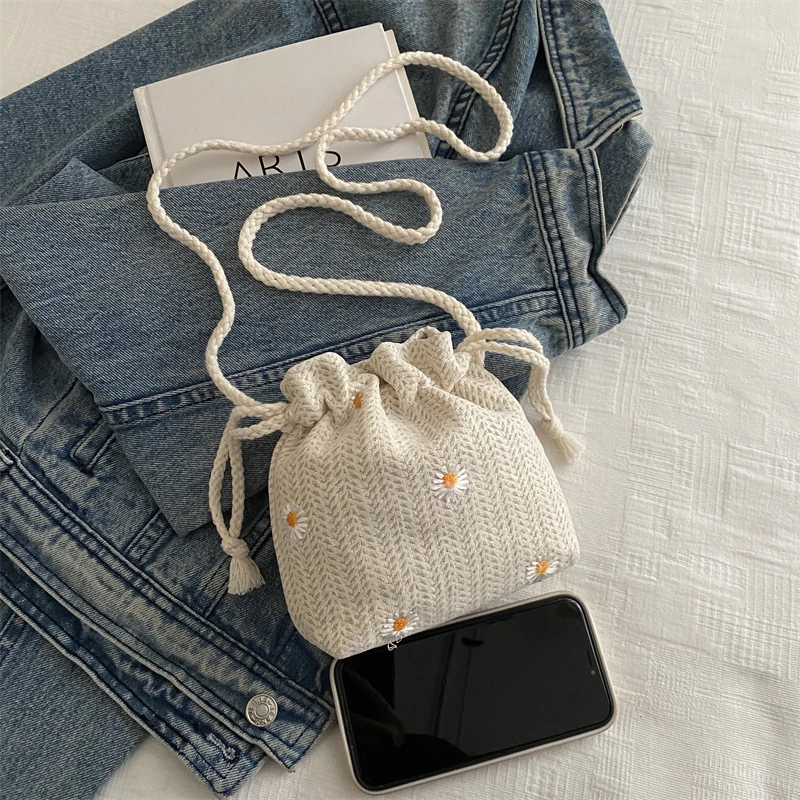 Sweet and Premium Beach Grass Woven Mini Bucket Bag Drawstring Design Single Shoulder Diagonal Crossbag Used for Vacation Travel